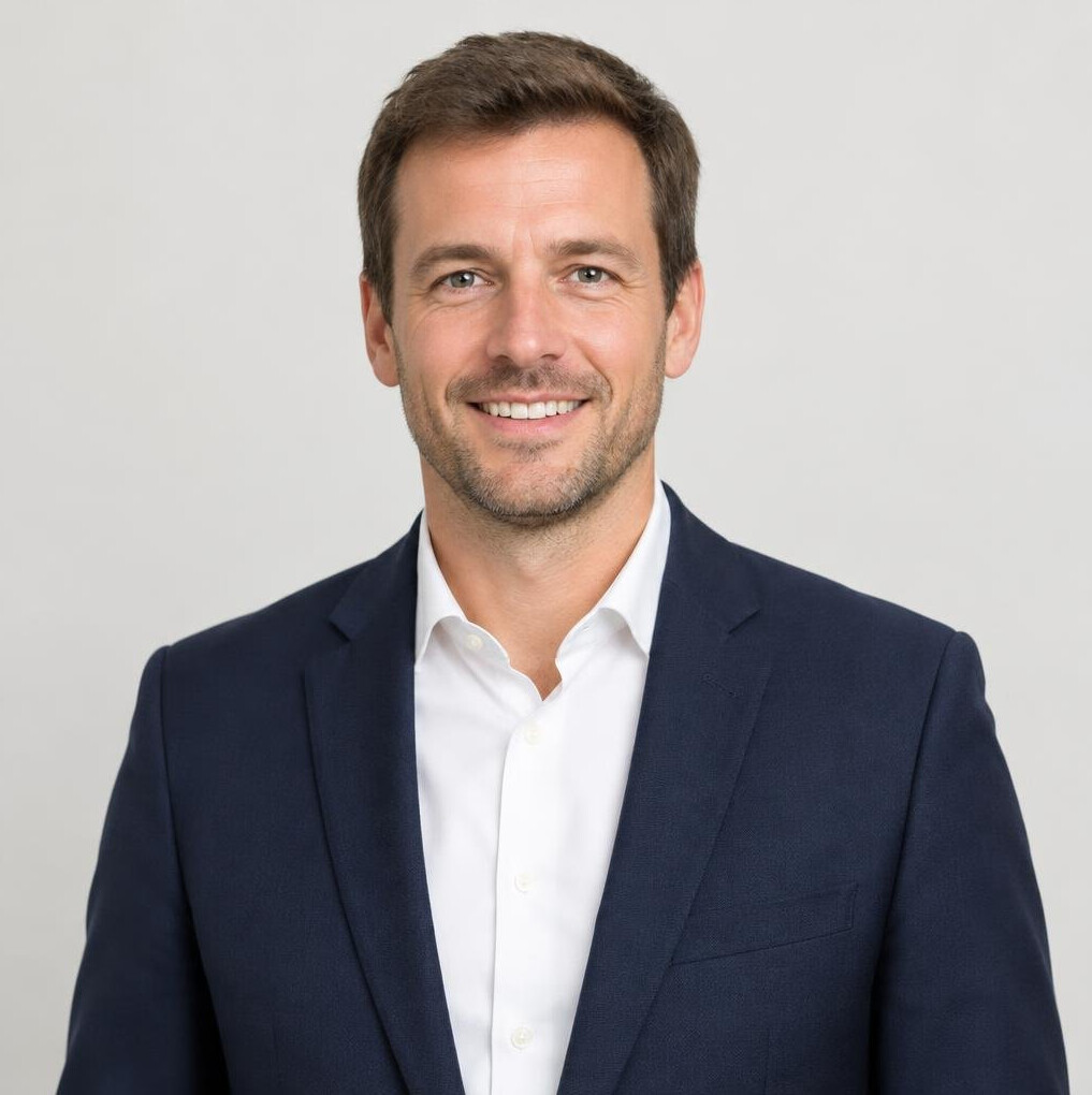Portrait of a smiling man in a business casual outfit